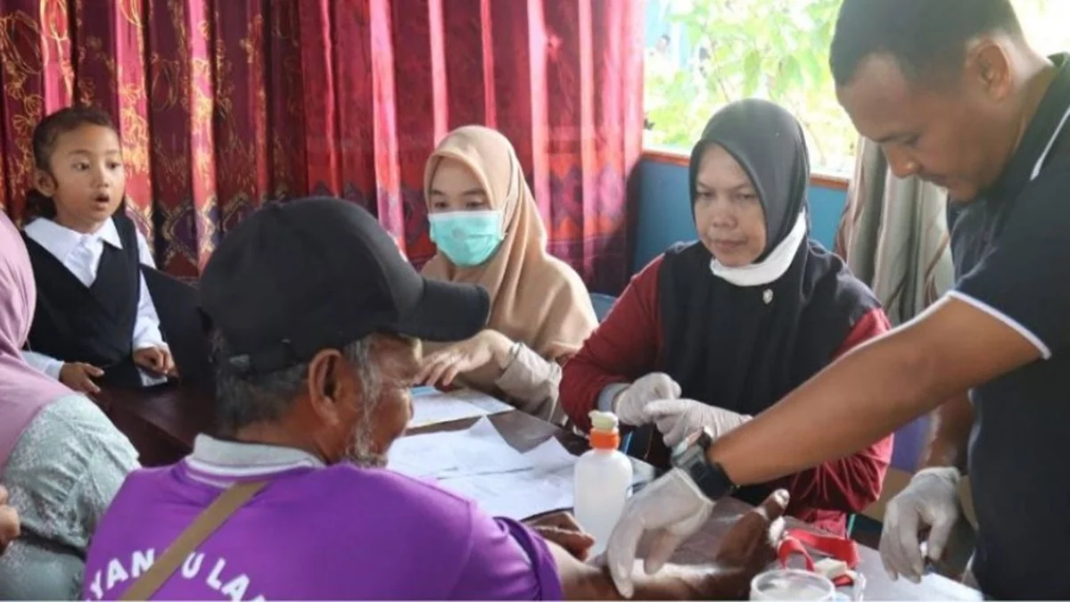 DPD PPNI Kabupaten Seruyan memperingati Hari Kesehatan Nasional (HKN) ke-61 dengan kegiatan pengabdian masyarakat di Desa Tanjung Rangas. Foto: MMCKalteng