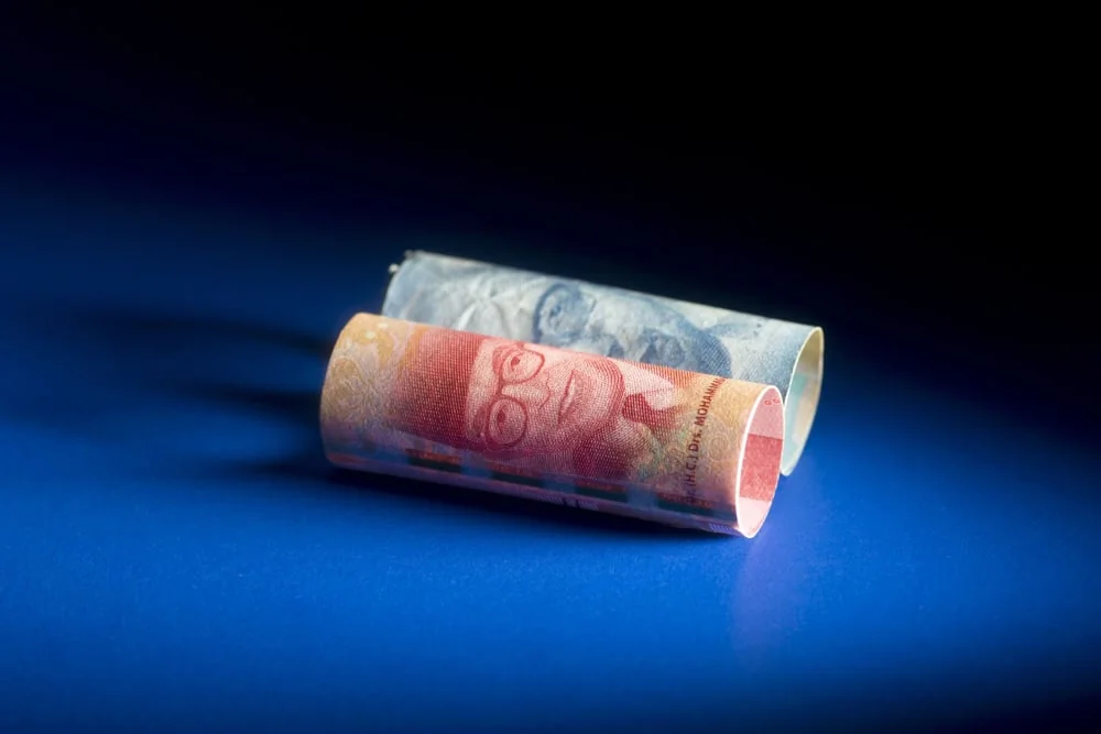 ilustrasi uang rupiah 100 dan 50. (int)